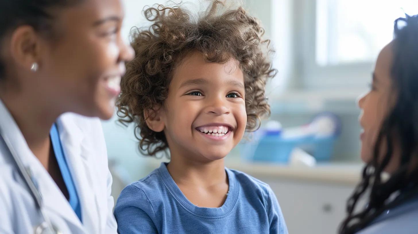 Smiling child with a pediatric therapist during an evaluation session