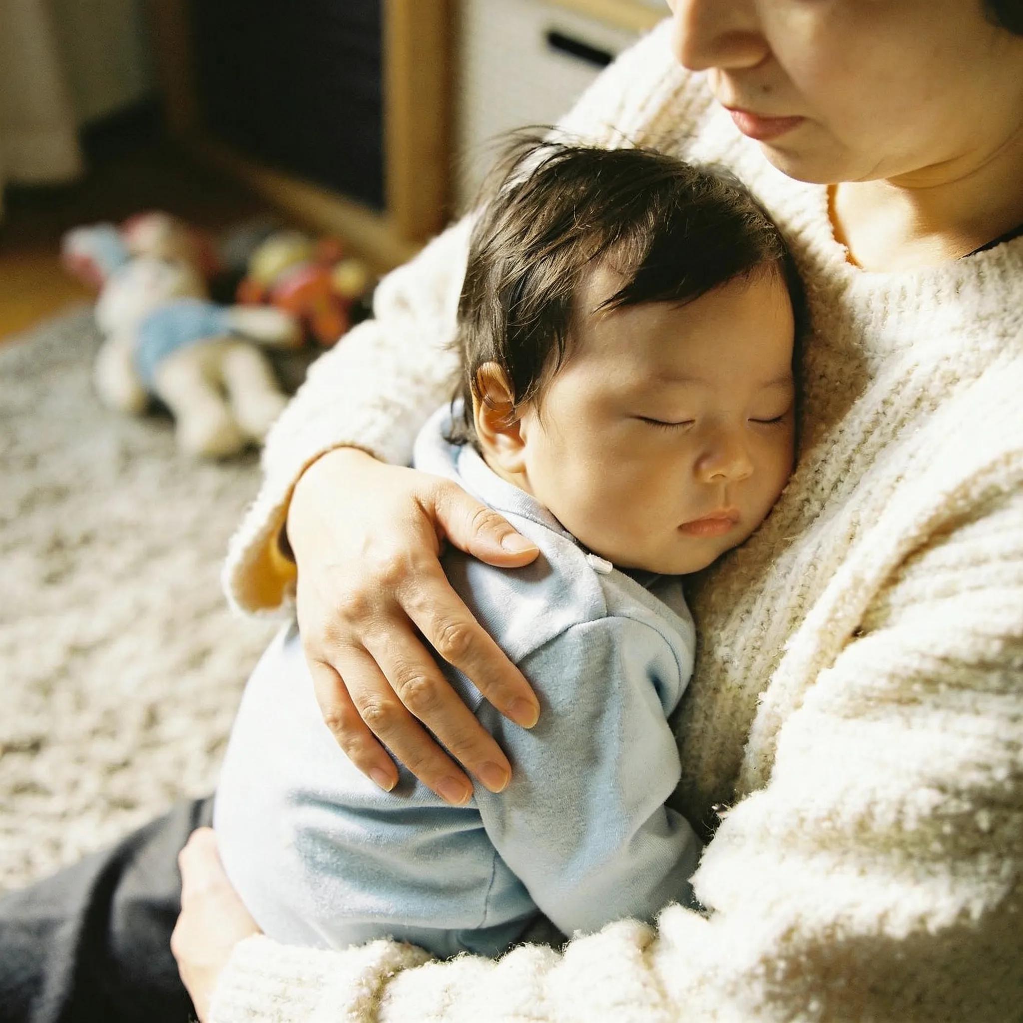 Parent offering comfort to a child to illustrate secure attachment within the DIRFloortime approach